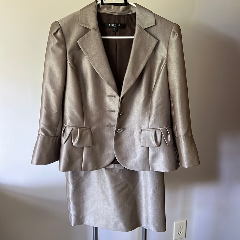 Nine West suit jacket and skirt, dark griege color. Size 6